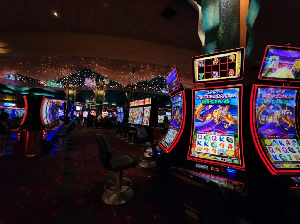 Casino slot machines lined up on a gaming floor, illustrating real gameplay context for no-deposit bonuses